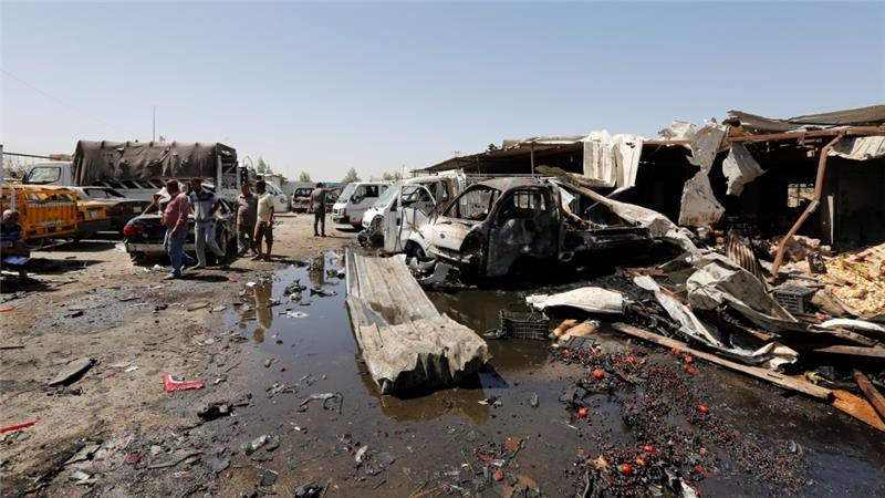 Bom mobil di pasar Rashidiyah, di bagian utara Ibukota Irak, Baghdad, Selasa (12/7).