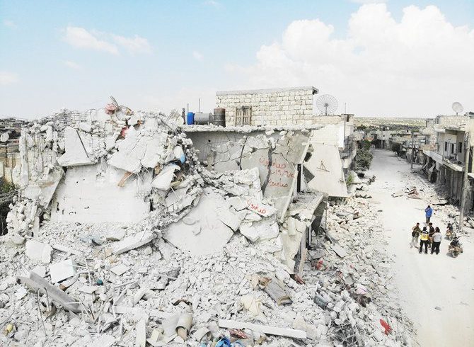 Bangunan yang rusak dan hancur di kota Ihsim, di wilayah Idlib Suriah, pada hari Jumat. (Foto:AFP/Arab News)